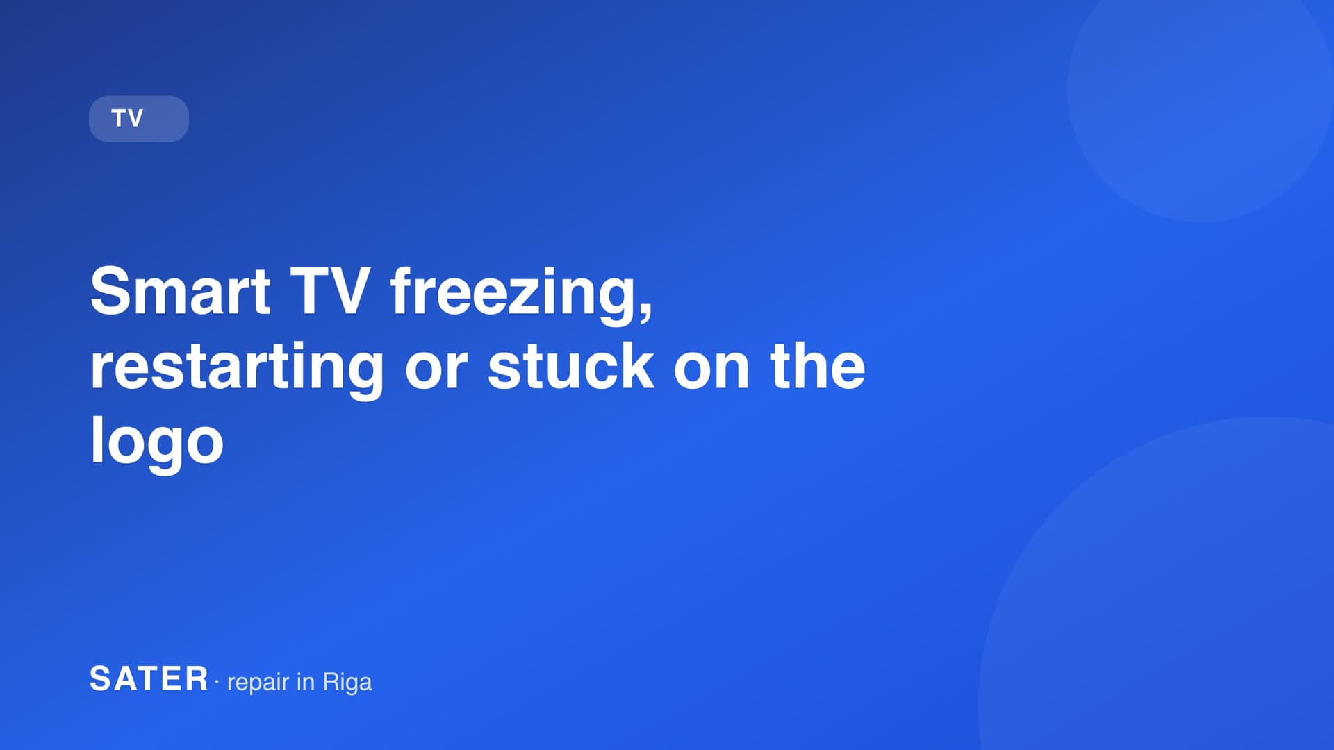 Smart TV stuck on the brand logo boot screen in a dark room