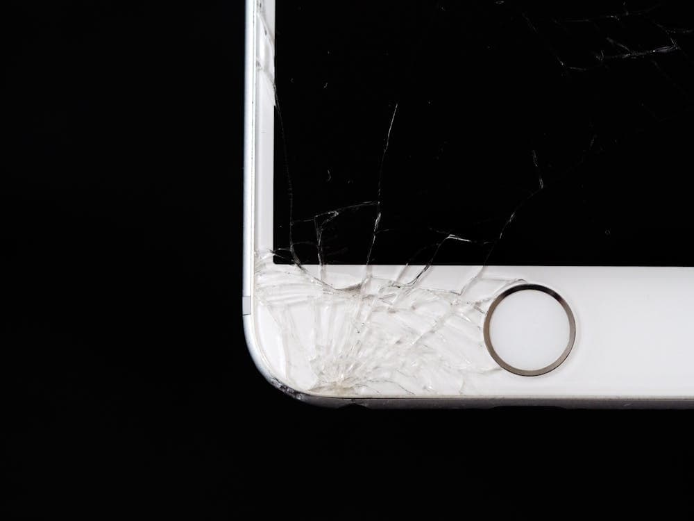 Cracked smartphone screen — repair or replace damaged electronics