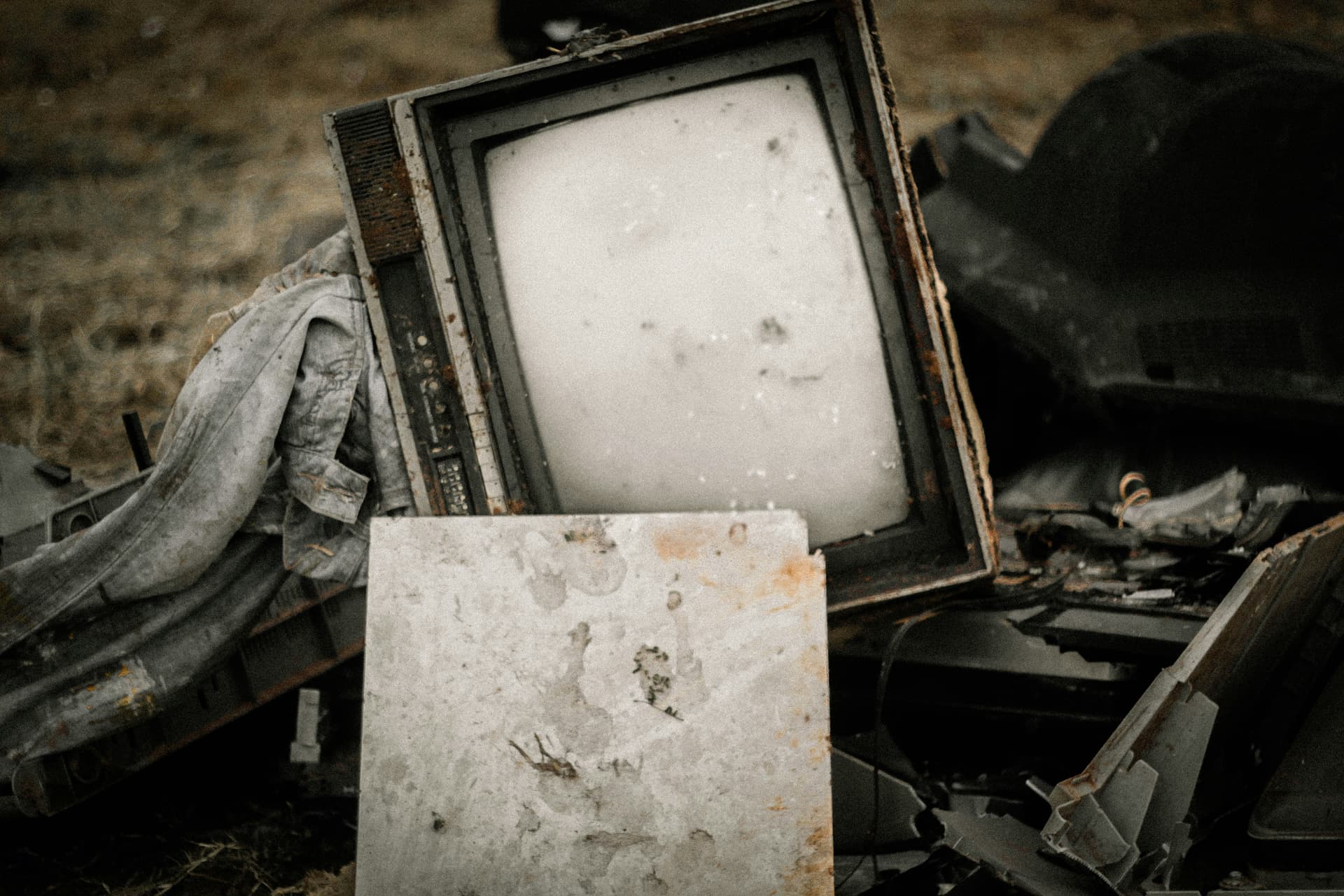 Abandoned old CRT television discarded outdoors — why regular maintenance matters